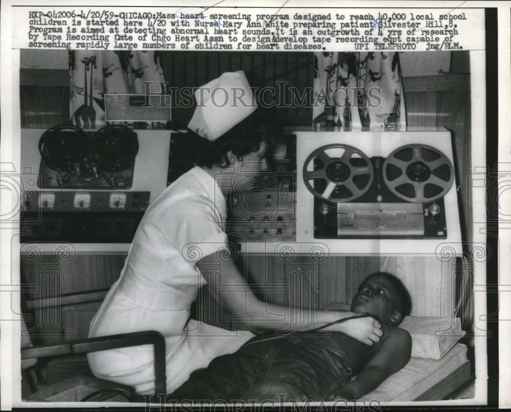 1959 Press Photo Nurse Mary Ann White prepares Silvester Hill for operation