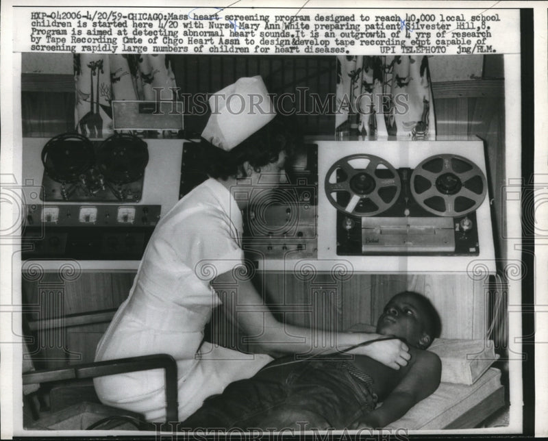 Load image into Gallery viewer, 1959 Press Photo Nurse Mary Ann White prepares Silvester Hill for operation
