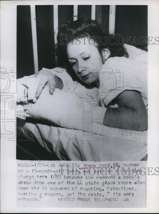 1953 Press Photo Irene Ford was held due to snatching a baby dress from a store