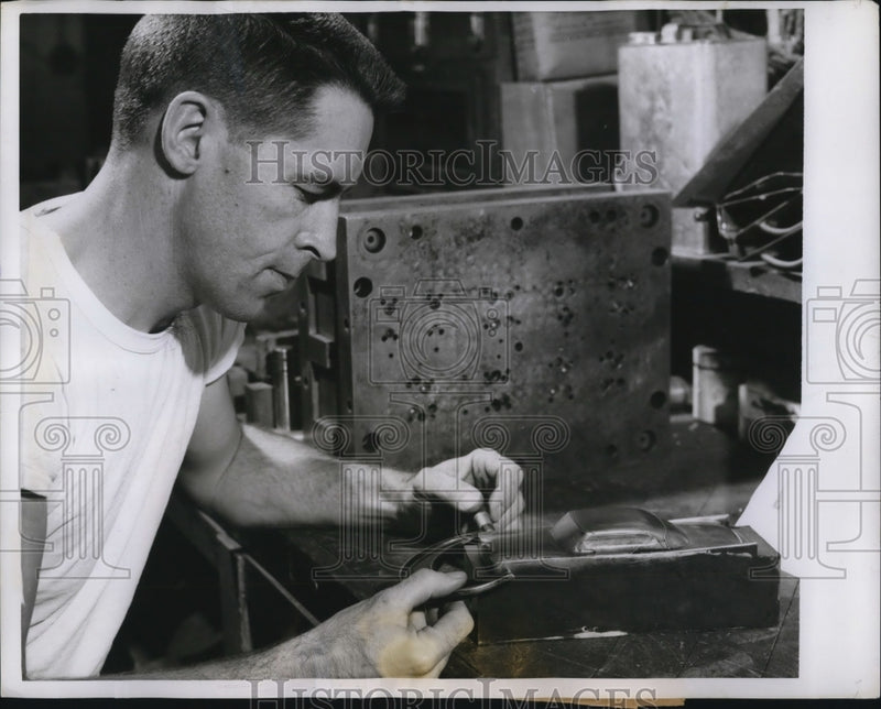 Load image into Gallery viewer, 1958 Press Photo Worker using a Micrometer to check Model - nee11264
