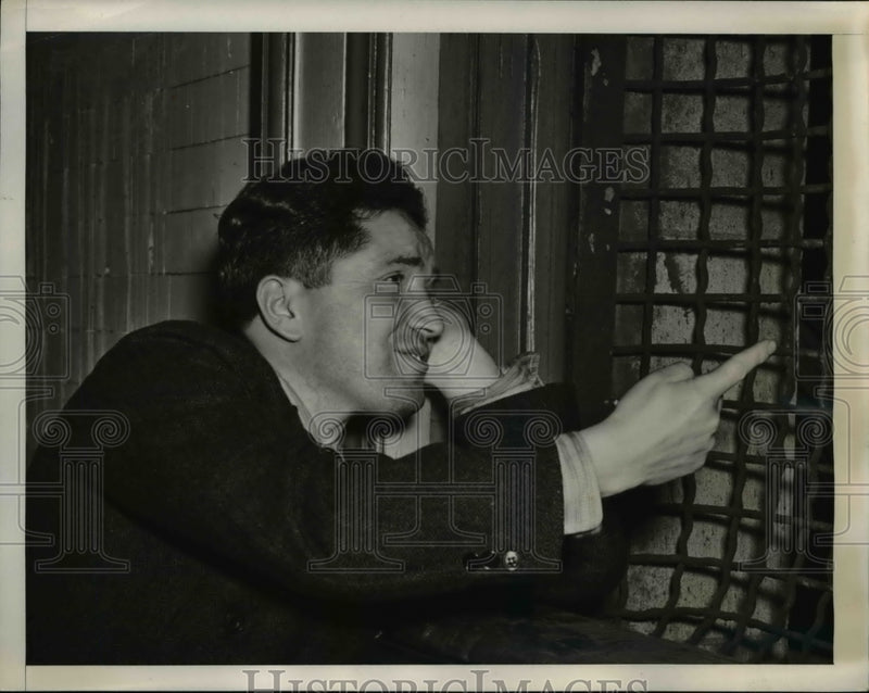 Load image into Gallery viewer, 1940 Press Photo Capt. Ivan I. Poderjay Looking out Window
