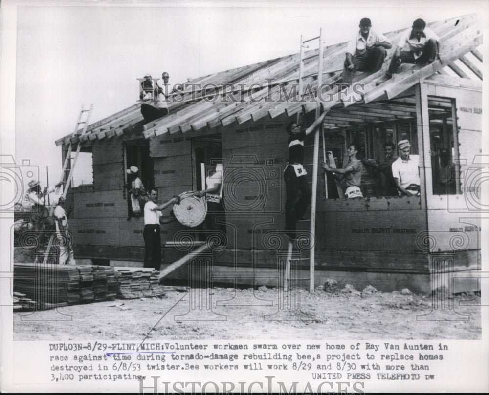 1953 Press Photo Flint, Mich workers rebuilding after tornado - nee13730