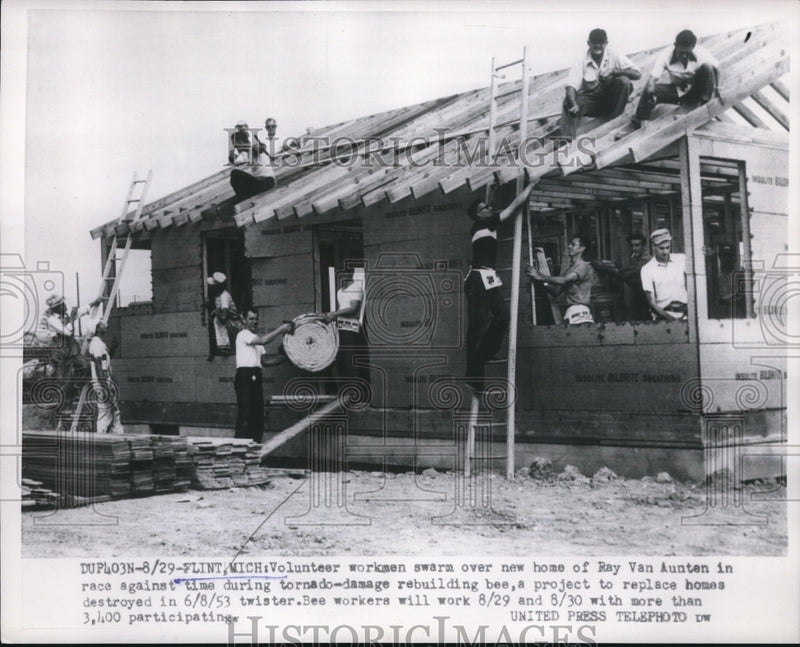 Load image into Gallery viewer, 1953 Press Photo Flint, Mich workers rebuilding after tornado - nee13730
