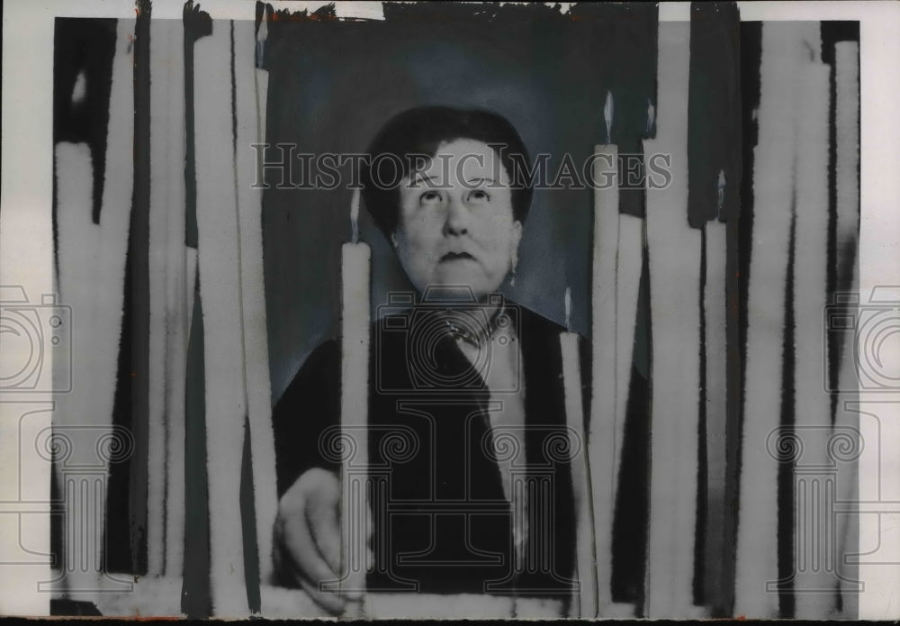 1954 Press Photo Woman Places Candle for Health of Pope Pius XII, Rome