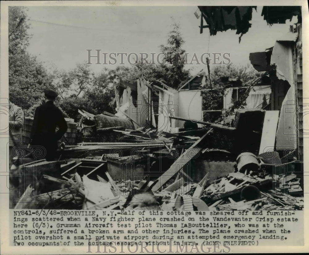 1948 Press Photo Wreckage of a Navy fighter plane crashing into the Vandevanter- Historic Images