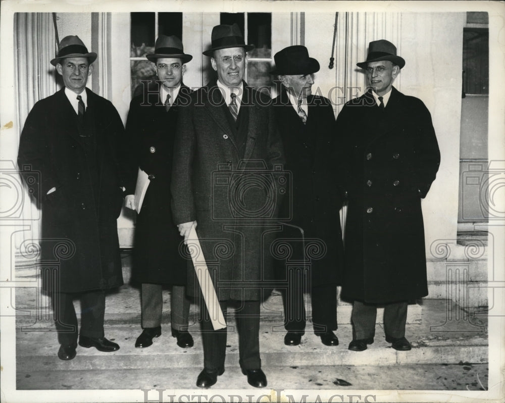 1937 Press Photo of Henry Morgenthau Jr, (R) and his staff.
