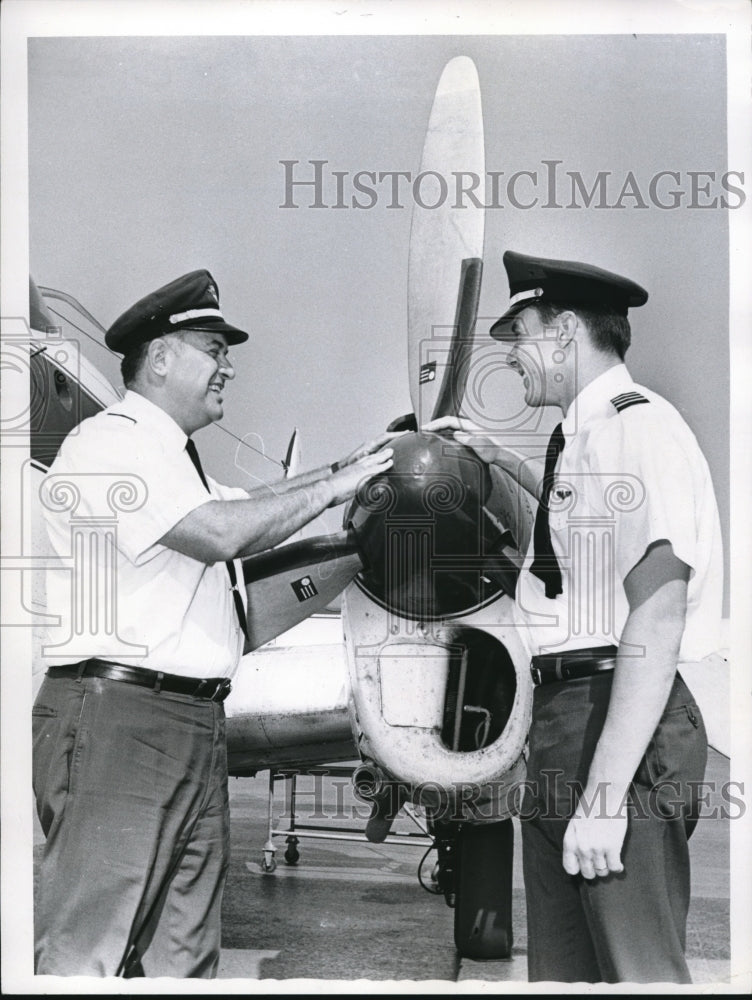 Load image into Gallery viewer, 1967 Press Photo Captain Tom Tector with son Tom Jr. both TH6 Airlines pilot
