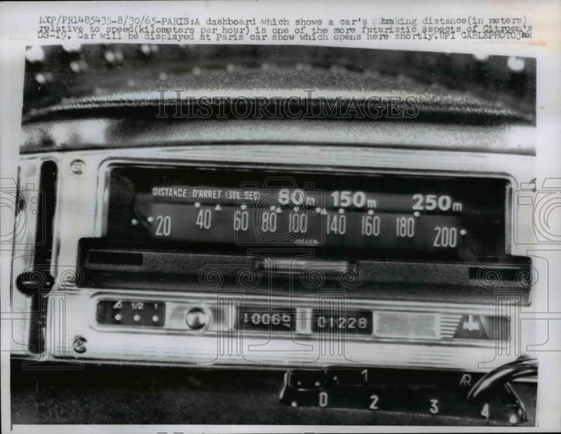 Load image into Gallery viewer, 1965 Press Photo Dashboard shows car's distance in meters as well as speed
