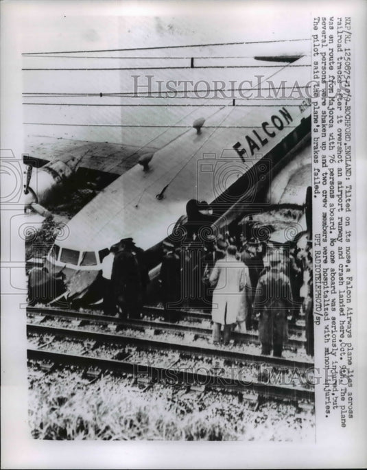 1960 Press Photo Falcon Airways Plane Lands on Railroad Tracks No Injuries