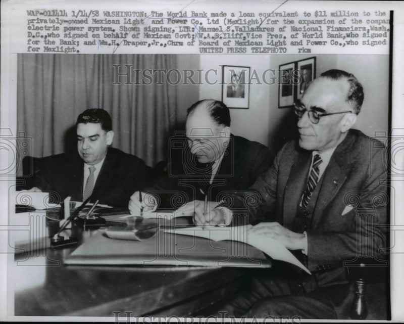 Load image into Gallery viewer, 1958 Press Photo World Bank load signed by Manuel S. Valladares, H. Draper Jr.
