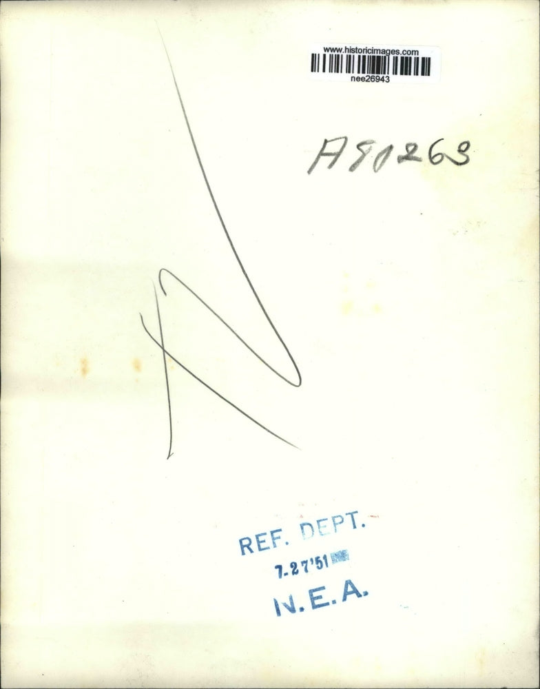 1951 Press Photo Arnold S. Johnson leaving jail handcuffed - nee26943