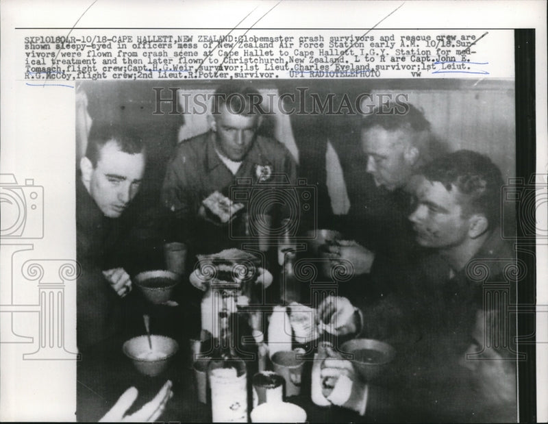 Load image into Gallery viewer, 1958 Press Photo Clobmaster crash survivors, rescue crew, Capt. John E. Tomasch

