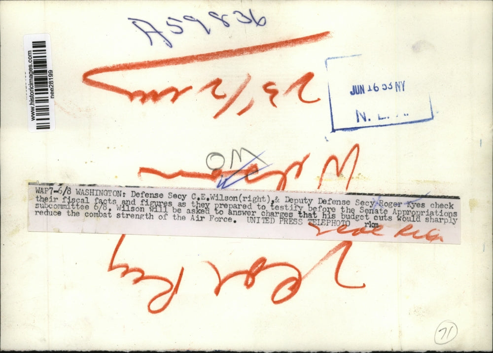 1953 Press Photo Secy C.E. Wilson and Secy Roger Kyes check fiscal facts