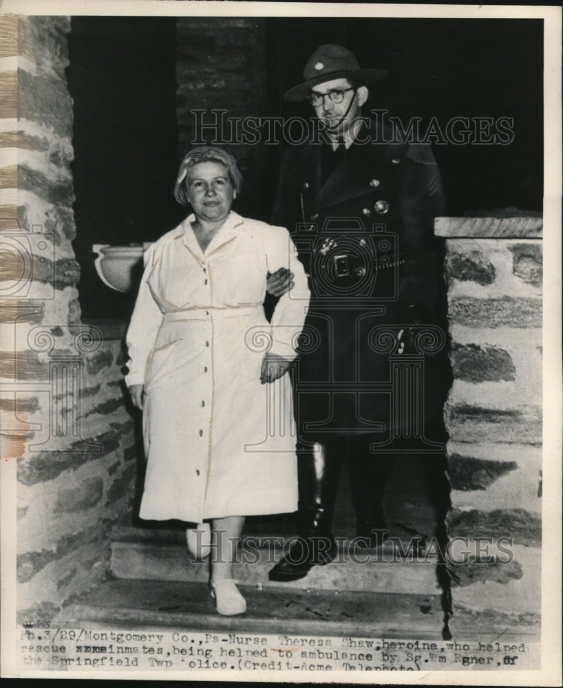 1950 Press Photo Nurse Theresa Shaw being helped to Ambulance - nee28646