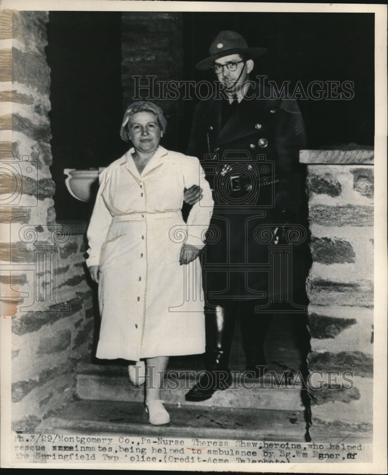 Load image into Gallery viewer, 1950 Press Photo Nurse Theresa Shaw being helped to Ambulance - nee28646
