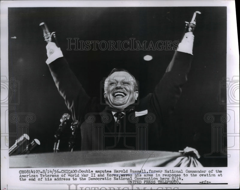 Load image into Gallery viewer, 1956 Press Photo Double Amputee Veteran Harold Russell Waves Arms - nee28956
