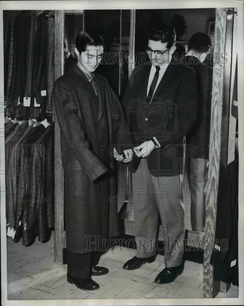 Load image into Gallery viewer, 1959 Press Photo Hirosharu Keiko Japanese Exchange Student Getting Clothes
