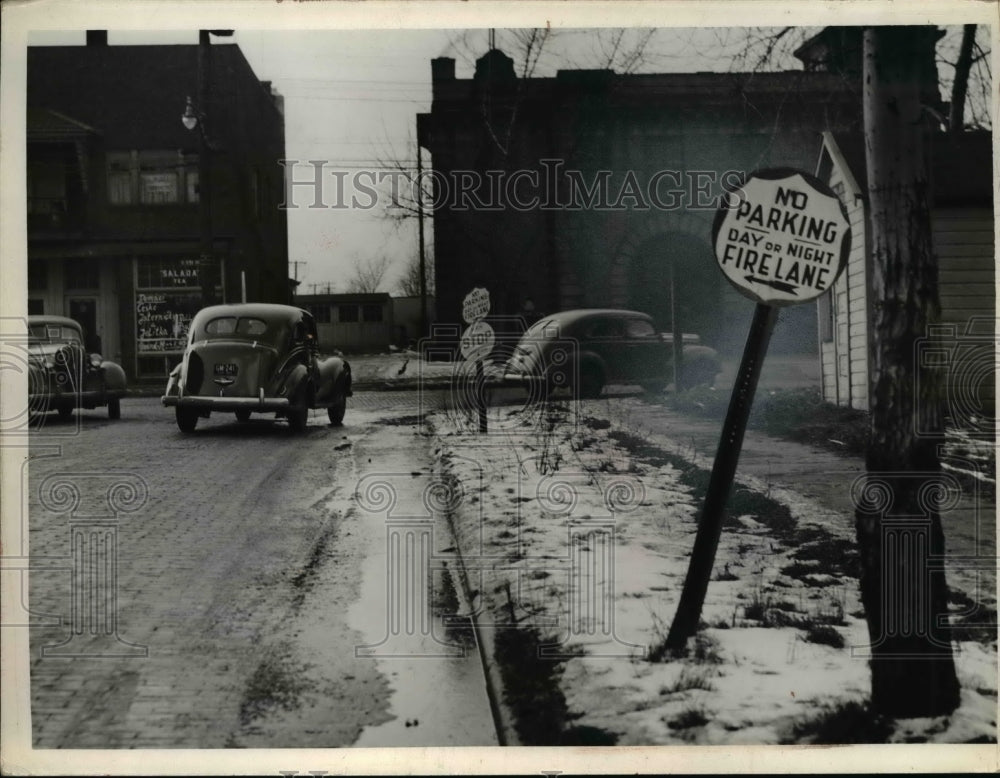 1941 Press Photo of a no parking sign that is leaning,