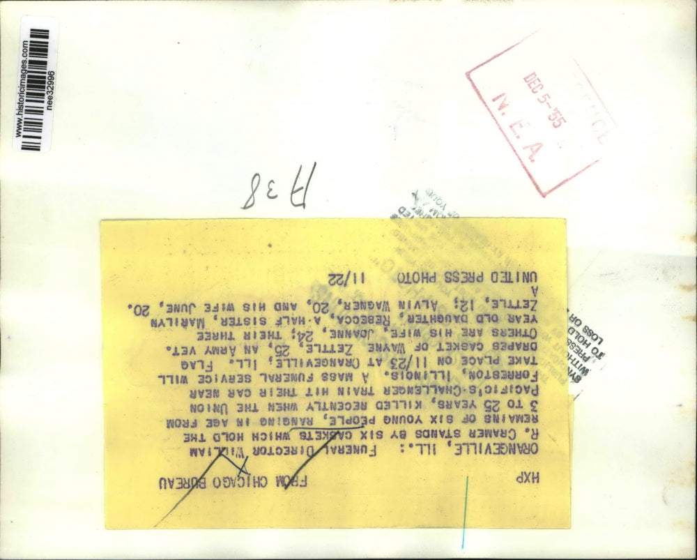 1955 Press Photo Funeral Director William R. Cramer stands by Six Caskets