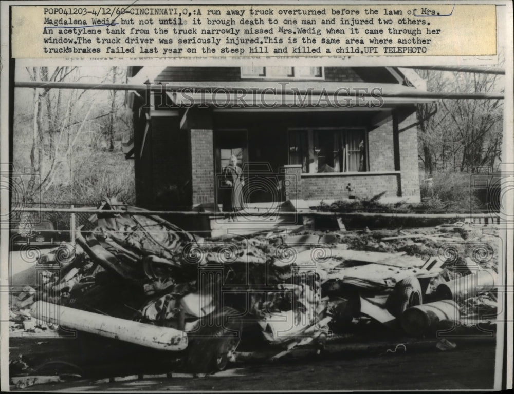 1960 Press Photo Mrs. Magdalena Wedig's Lawn had A ovet turned run Away Truck
