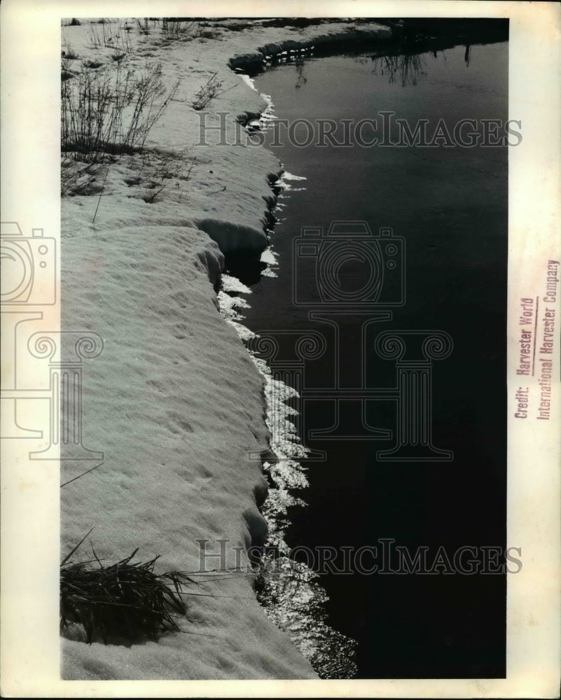 1963 Press Photo of the last of winter as spring loosens its iron grip.