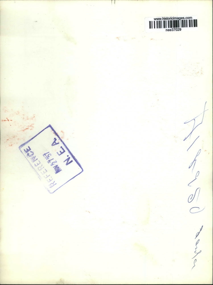 1957 Press Photo Santa Claus Cries as he Presents List