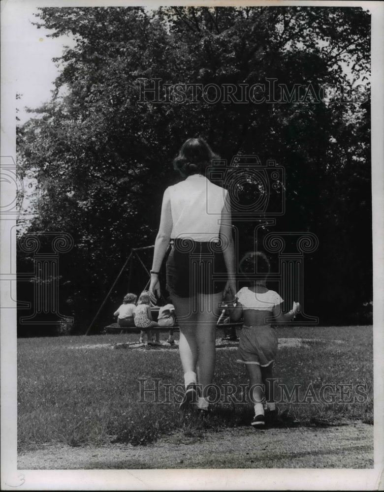 1956 Press Photo Little Becky Potenzina with Counselor Miss Lois Sielaff