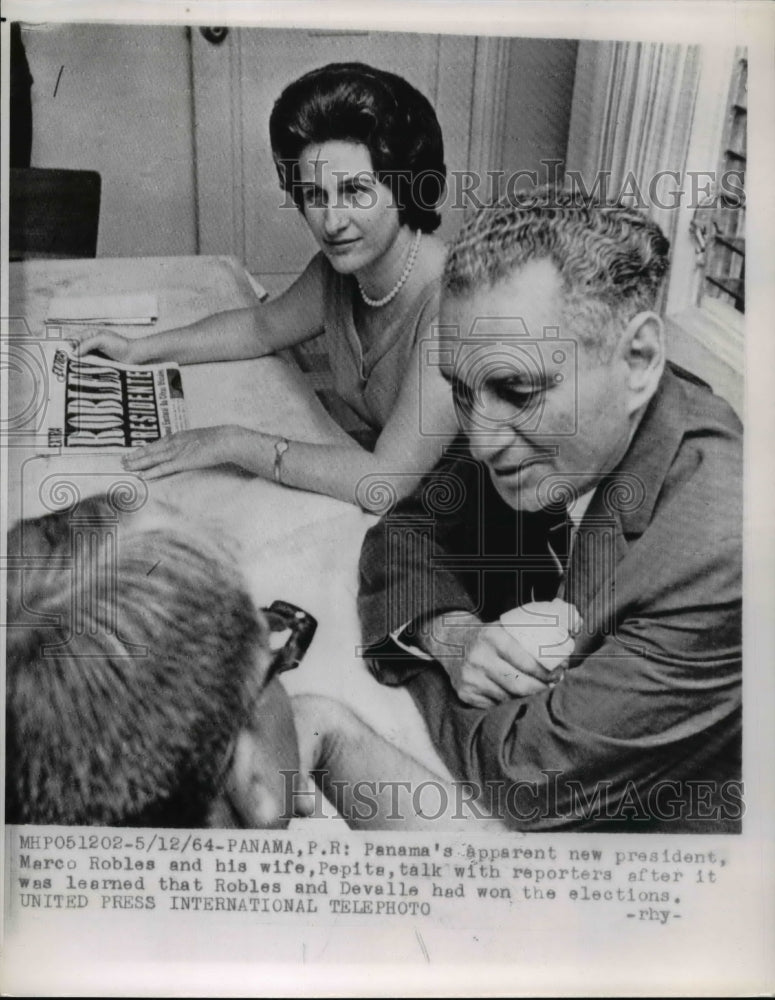 Load image into Gallery viewer, 1964 Press Photo Pres Marco Robles&amp;Pepita with reporters after winning elections
