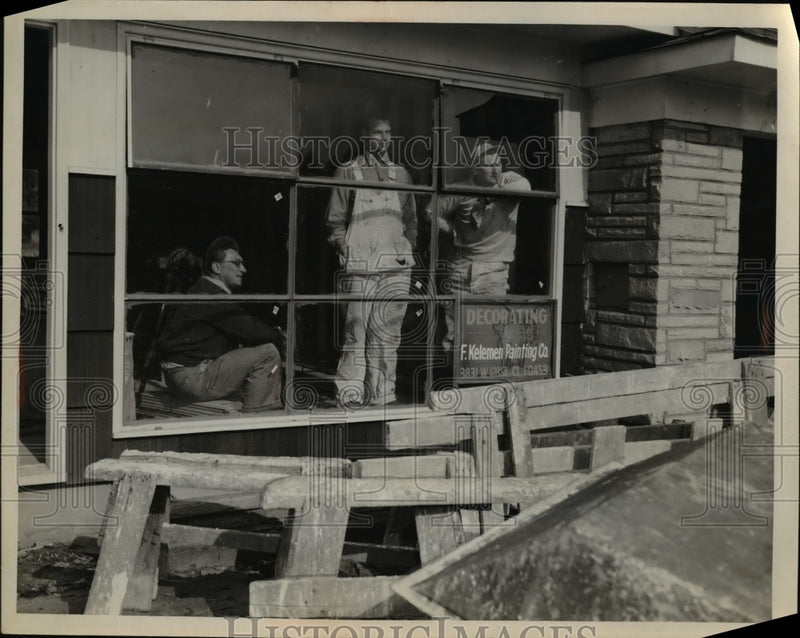 Load image into Gallery viewer, 1954 Press Photo Ready for work but waiting for contract to be signed.
