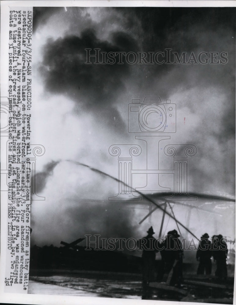 1955 Press Photo San Francisco firemen battling a four alarm fire. - nee48465
