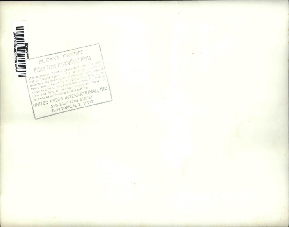 1969 Press Photo Car stuck in the mud on football field at Pacific College.