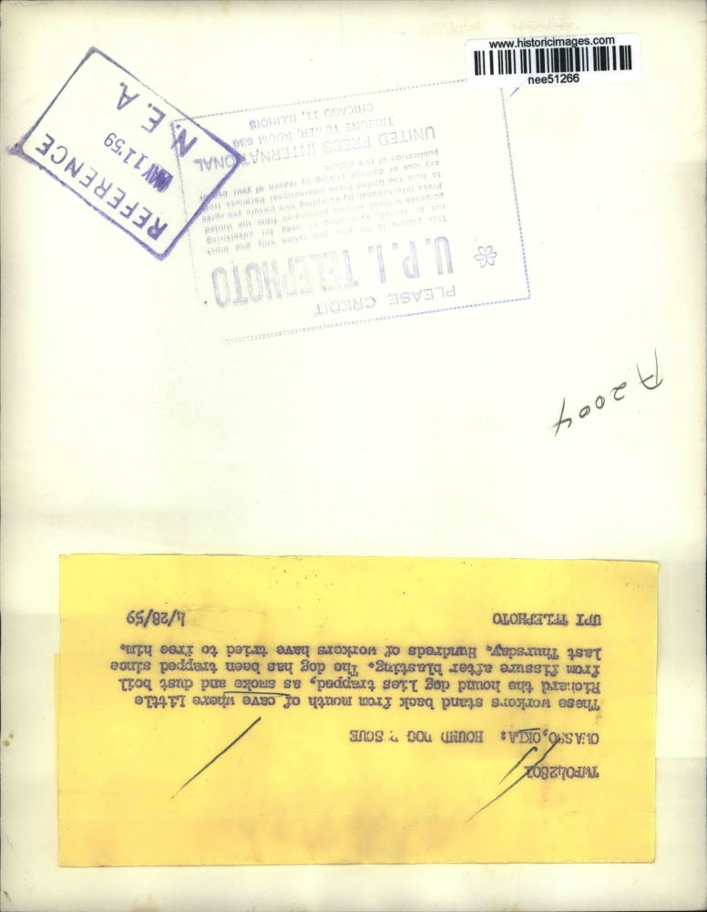 1959 Press Photo Owasso, Oklahoma Hound Dog rescue in Caves - nee51266