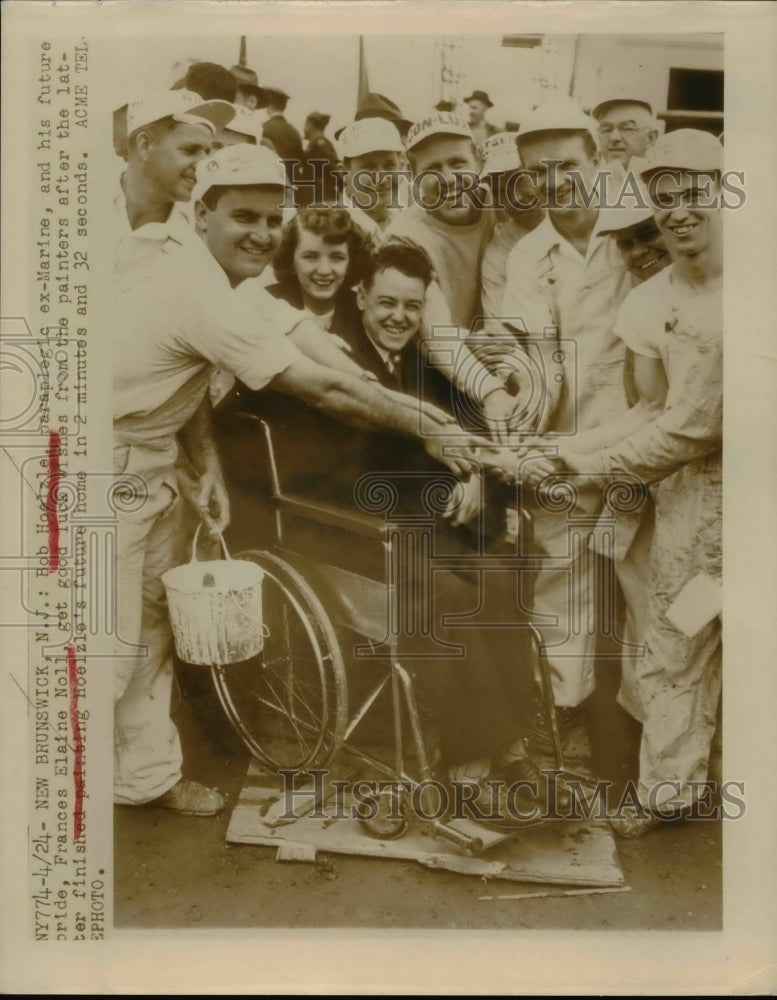 Load image into Gallery viewer, Undated Press Photo Bob Hoelzle,paraplegic ex-Marine with his future Bride.

