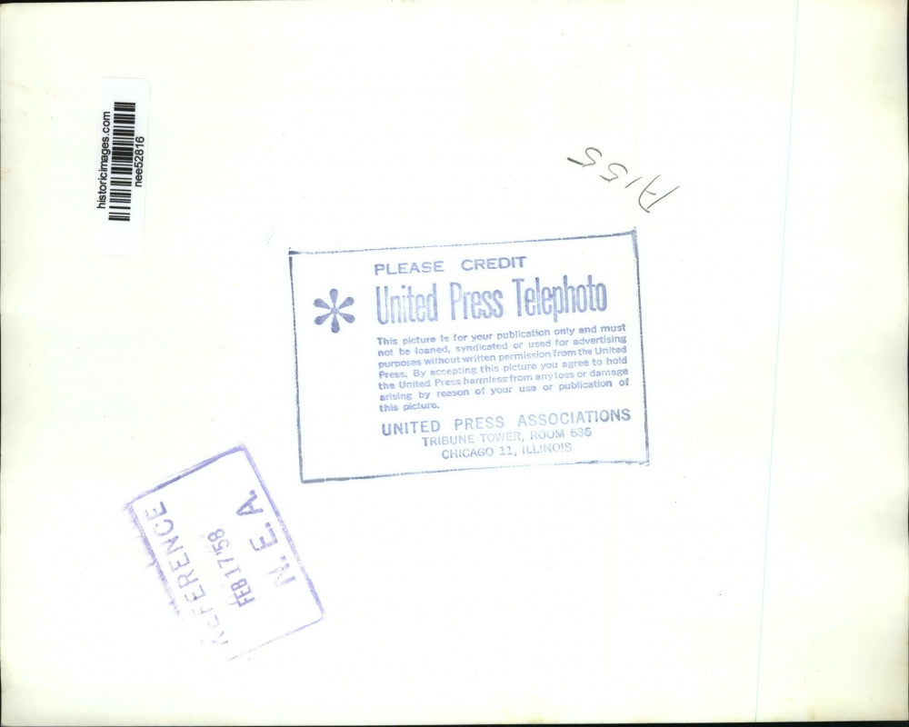 1958 Press Photo Michael Elton 8, rescued in drenching rain in Calif. Bay.