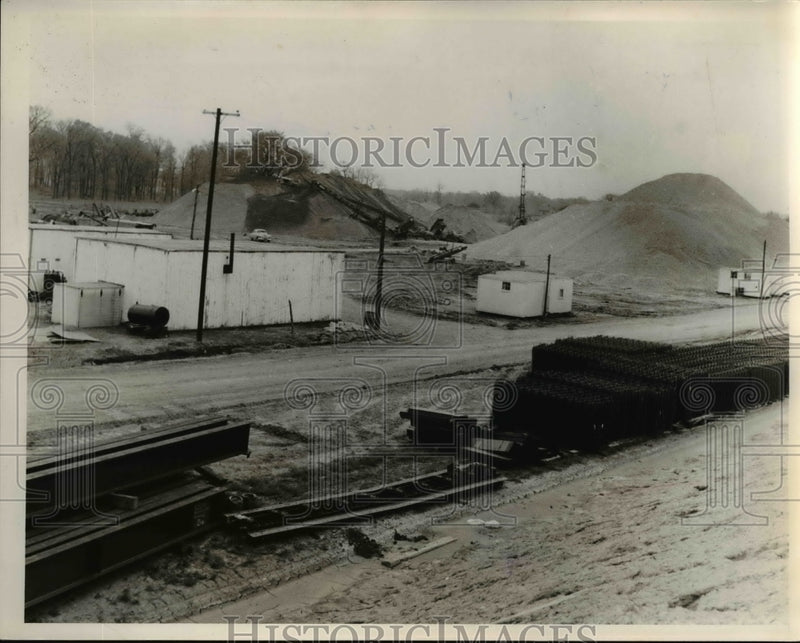 Load image into Gallery viewer, 1954 Press Photo Stockpiling Aggregates Near University of Akron - nee57603
