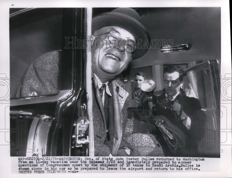Load image into Gallery viewer, 1956 Press Photo Washington DC Sec. of State John Foster Dulles in his car.
