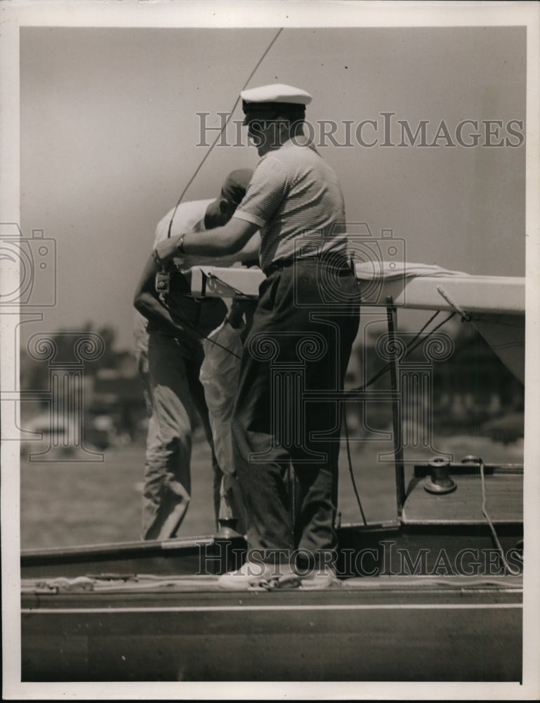 Load image into Gallery viewer, 1939 Press Photo Crown Prince Olav of Norway Prepares Yacht for Sailing
