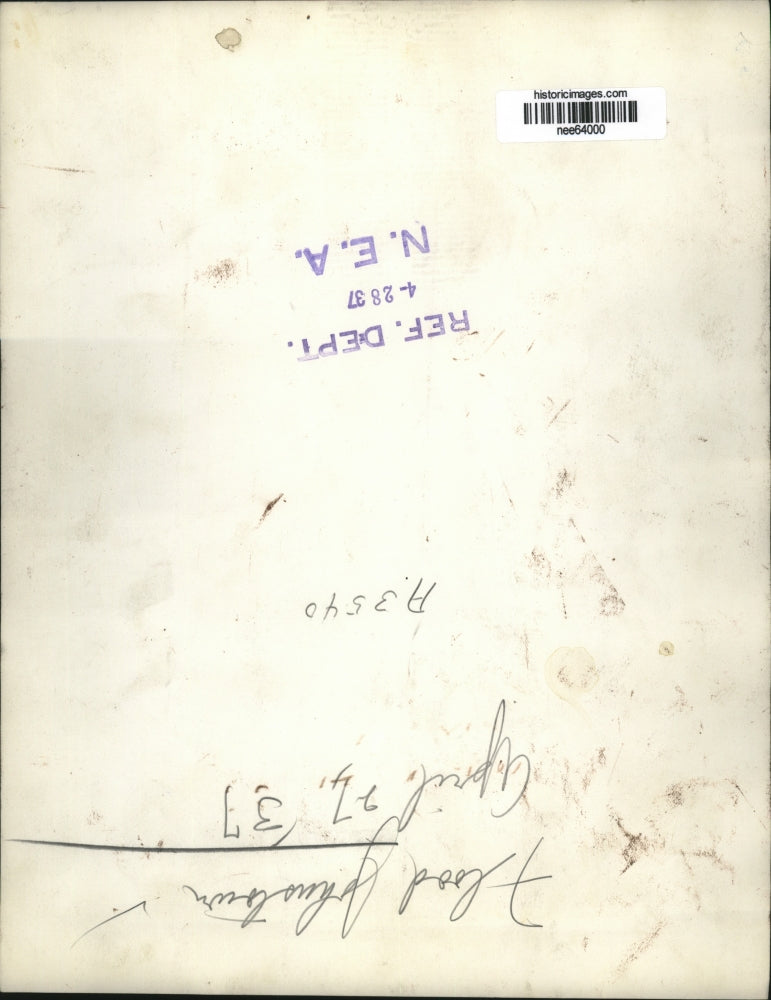 1937 Press Photo Flooded Town, Woman Being Carried Out of Water By Man