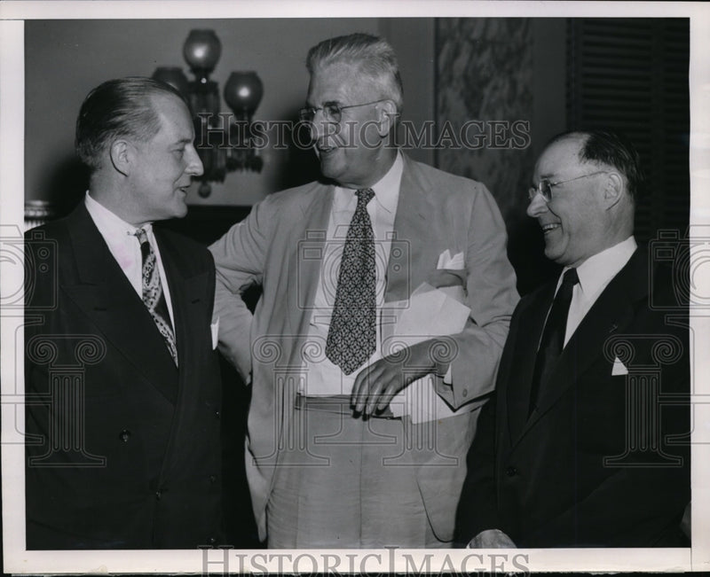 Load image into Gallery viewer, 1951 Press Photo Sen. Paul Douglas talks with Cornelius Harrington. - nee64353
