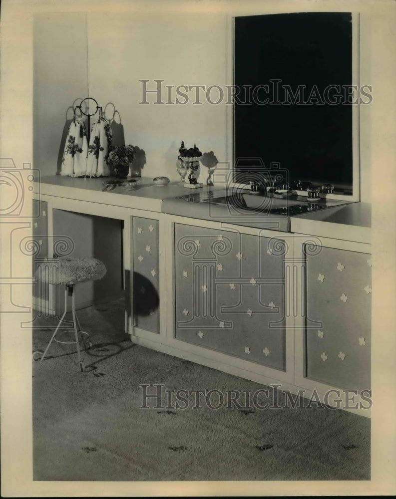 1962 Press Photo Storage cabinets are painted pink with white rosebuds in bath- Historic Images