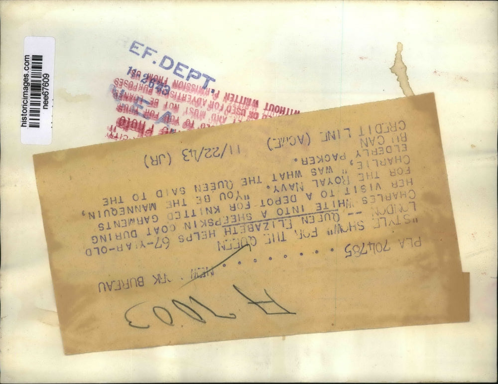 1943 Press Photo Queen Elizabeth helps Charles White into coat. - nee67609