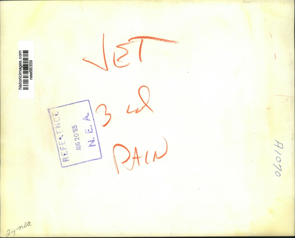 1965 Press Photo Lansing Bronson display some of the rainmaking equipment.