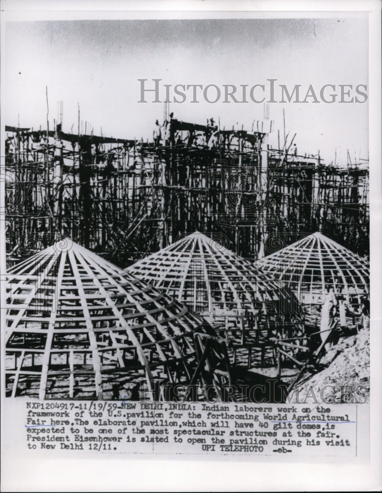 1959 Press Photo Indian laborers work on framework of the US pavilion- Historic Images