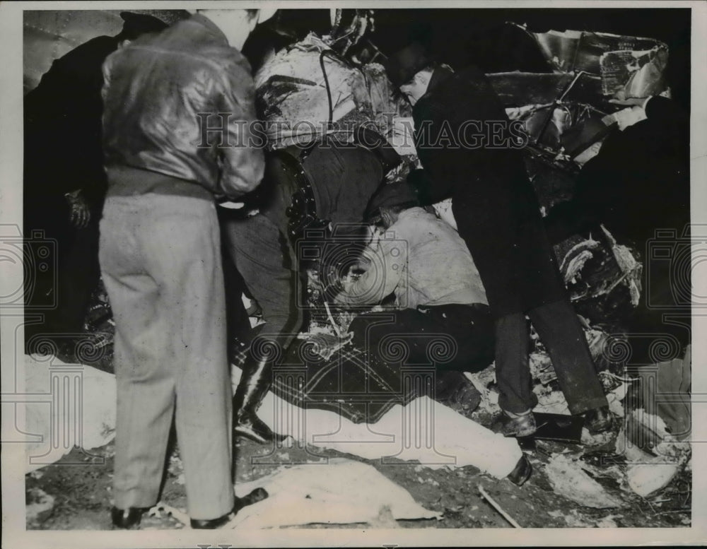 1937 Press Photo Search for Latest Airplane Crash Victims in Pittsburgh PA