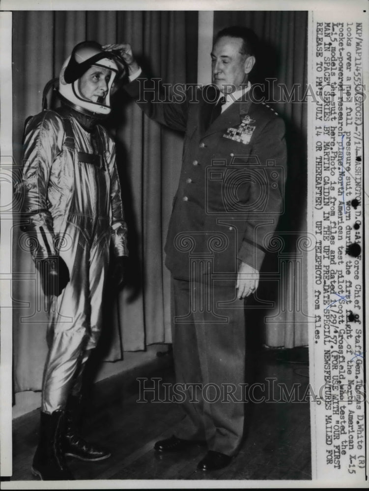 Load image into Gallery viewer, 1959 Press Photo Chief of Staff General Thomas D White Showing Suit for X-15
