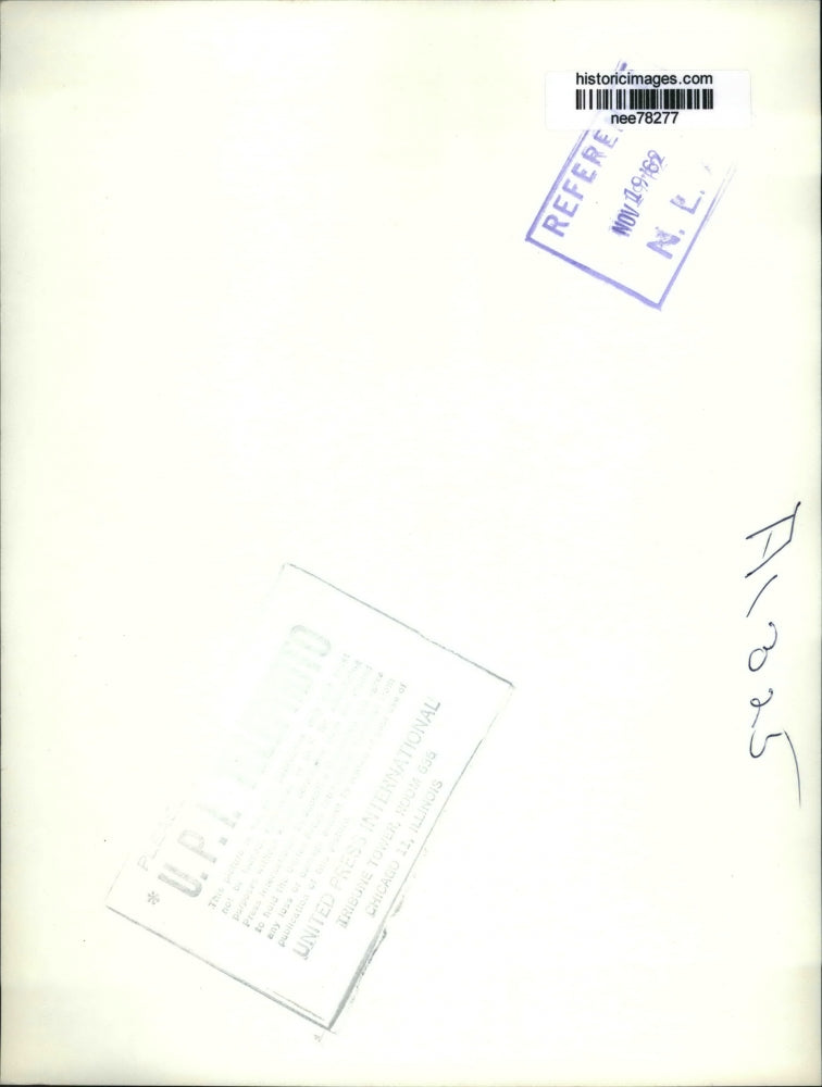 1962 Press Photo Julius Caruso hair style using a band and bun on top of head