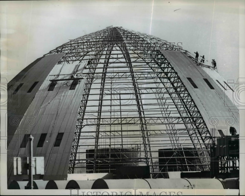 Load image into Gallery viewer, 1959 Press Photo Giant Sugar Silo being erected in the banks of the Mystic River
