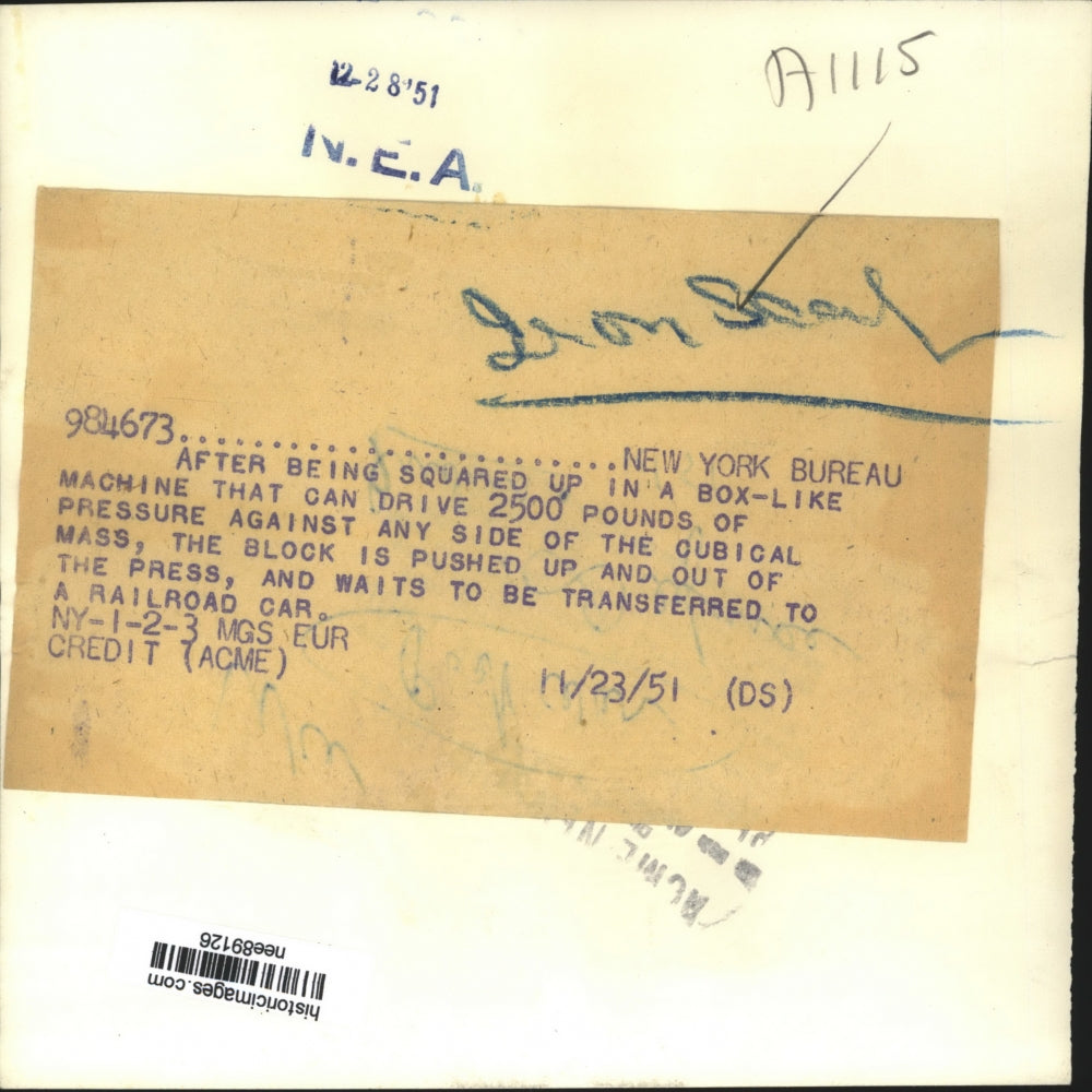 1951 Press Photo Iron Scarps being squared up in a Box like machine - nee89126