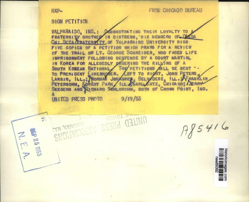 1953 Press Photo Omega Chi Beta Fraternity signs petition for George Schreiber