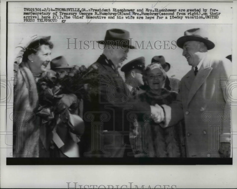 Load image into Gallery viewer, 1958 Press Photo Pres. Eisenhower and wife greeted by George m Humphrey and wife
